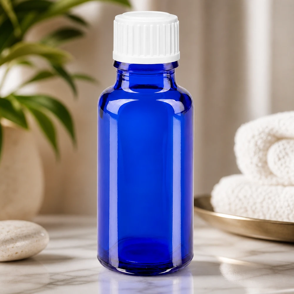 Lékárenská lahvička modrá 20ml šroubovací uzávěr bílý globule standardní Hochwertige blaue 20ml Tropfflasche aus UV-Schutzglas mit weißem Deckel