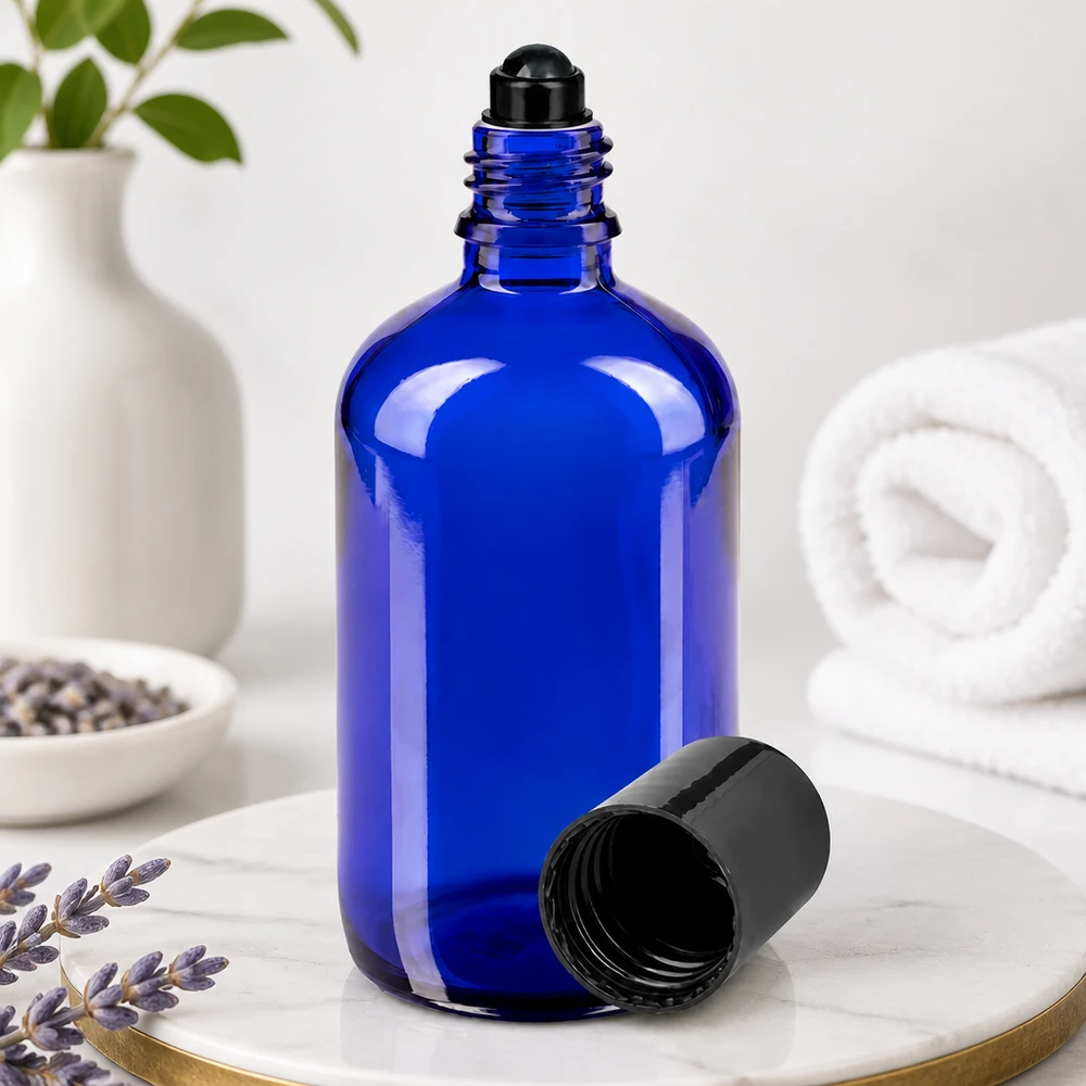 Lékárenská láhev modrá 100ml roll-on uzávěr černý Zylindrische 100ml Glasflasche Blau mit schwarzem Roll-On Aufsatz geöffnet