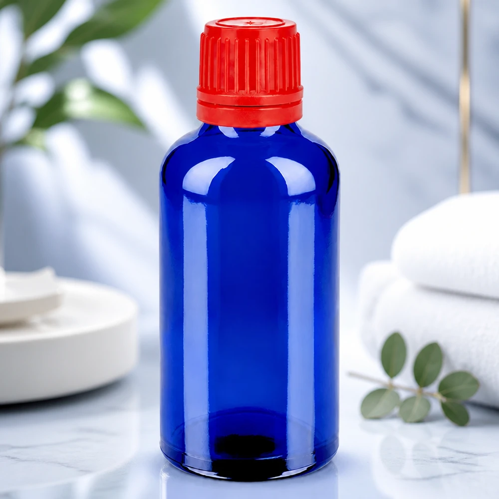 50ml láhev 11mm šroubovací uzávěr červený tamper-evidentní uzávěr BlueLine UT18/50 Kosmetik Flasche 50ml kobaltblau mit rotem Verschluss SV 11mm OV BlueLine UT18/50