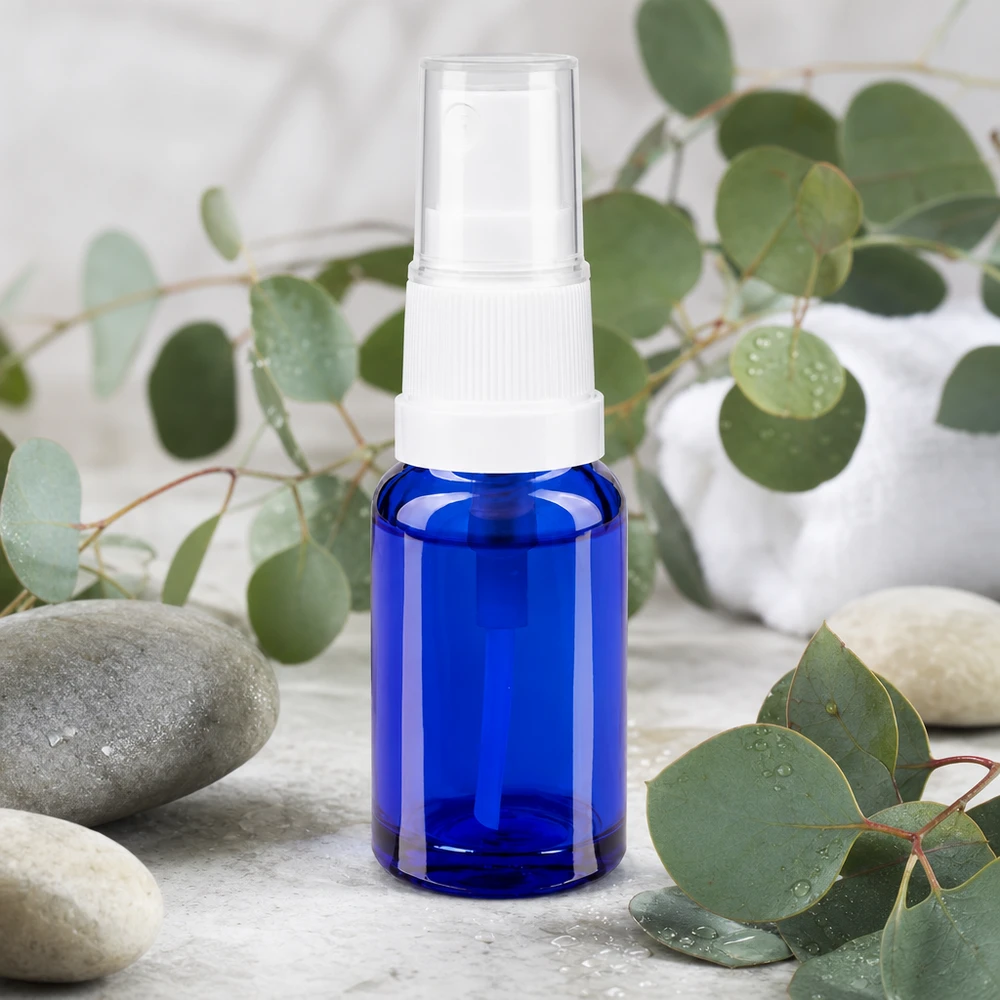 Blaue 10ml Miniatursprayflasche aus Schutzglas mit weißem Feinnebel-Zerstäuber für Hydrolate