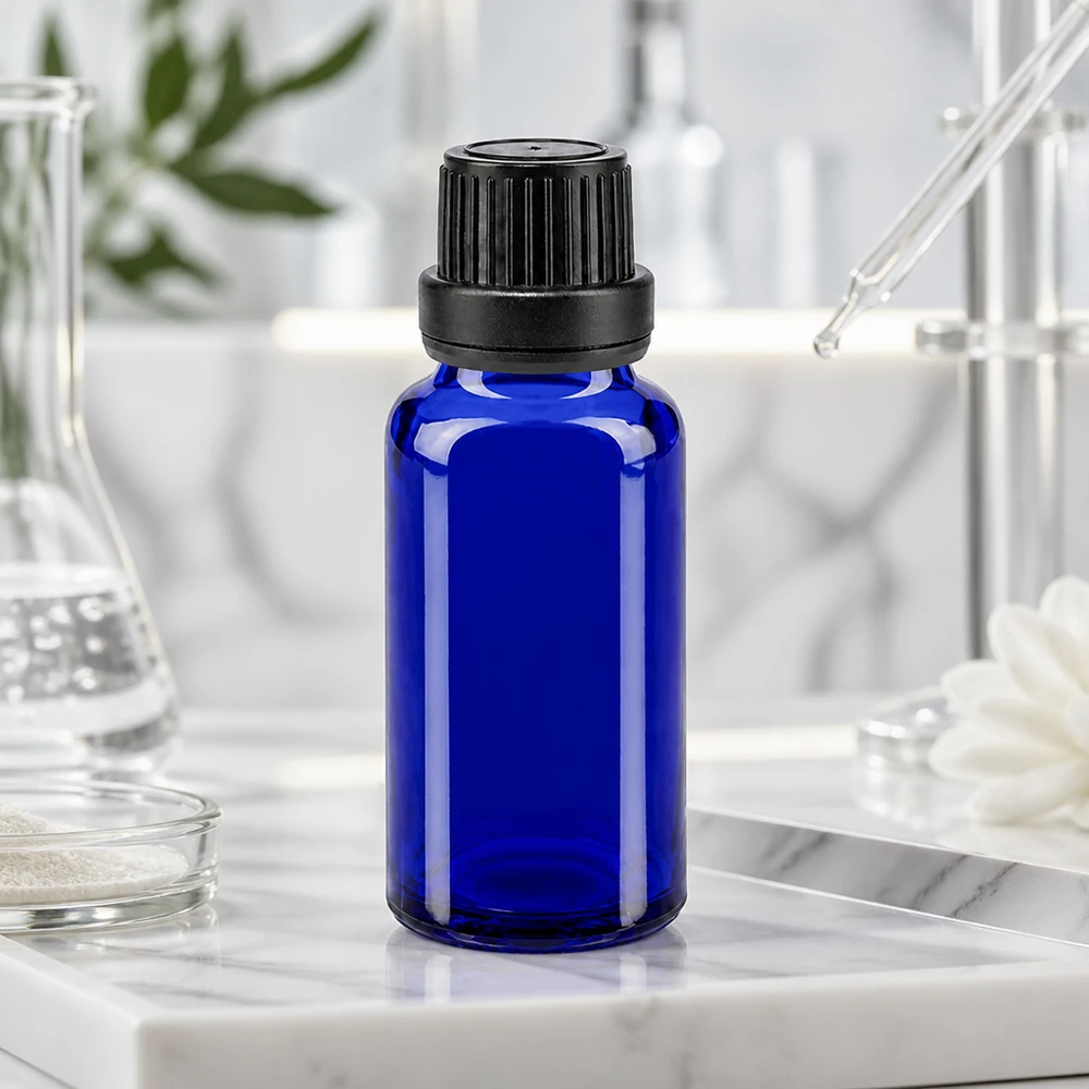 Lichtschutzflasche 20ml blau mit 2mm Tropfaufsatz und manipulationssicherem Verschluss