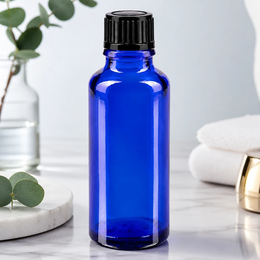 Lékárenská láhev modrá 30ml šroubovací uzávěr černá standardní Blaue zylindrische 30ml Glasflasche mit schwarzem Kunststoffverschluss für ätherische Öle