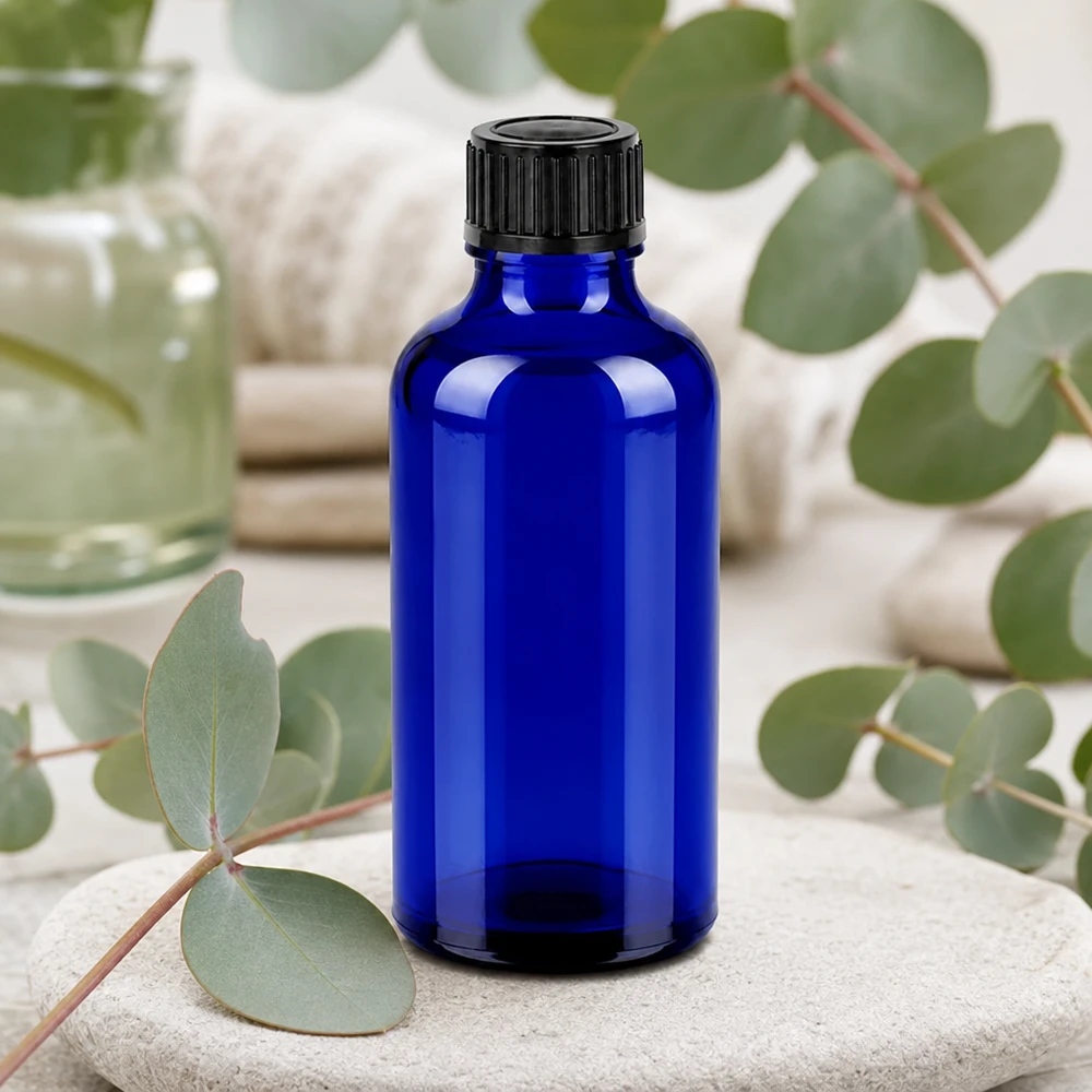 50ml láhev 11mm šroubovací uzávěr černý BlueLine UT18/50. Nachfüllbare 50ml Blauglasflasche mit festem schwarzen Schraubdeckel für Naturkosmetik und Seren