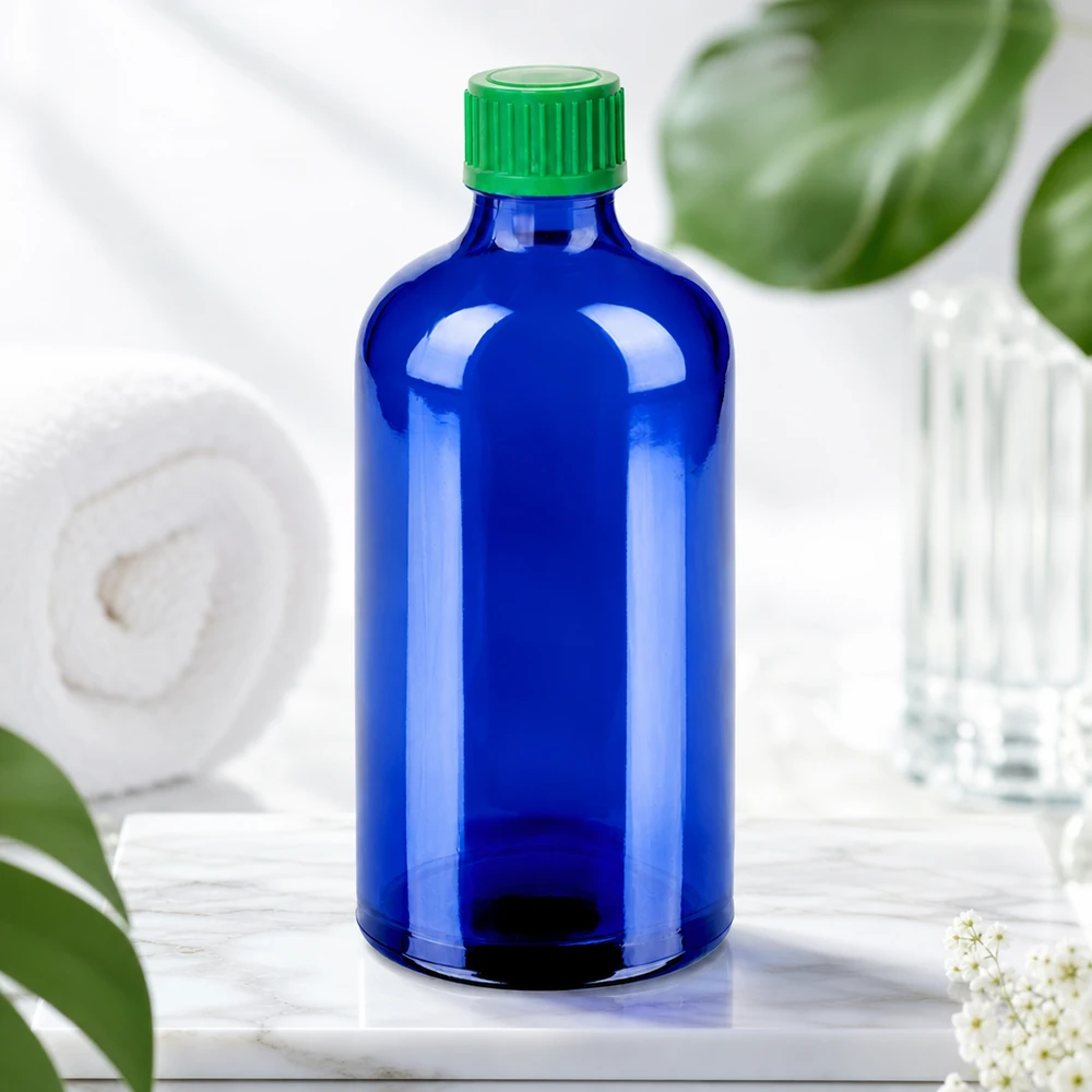 Robuste Tropfflasche 100ml mit mattiertem blauen Glas und grünem Standardgewinde UT18 Verschluss