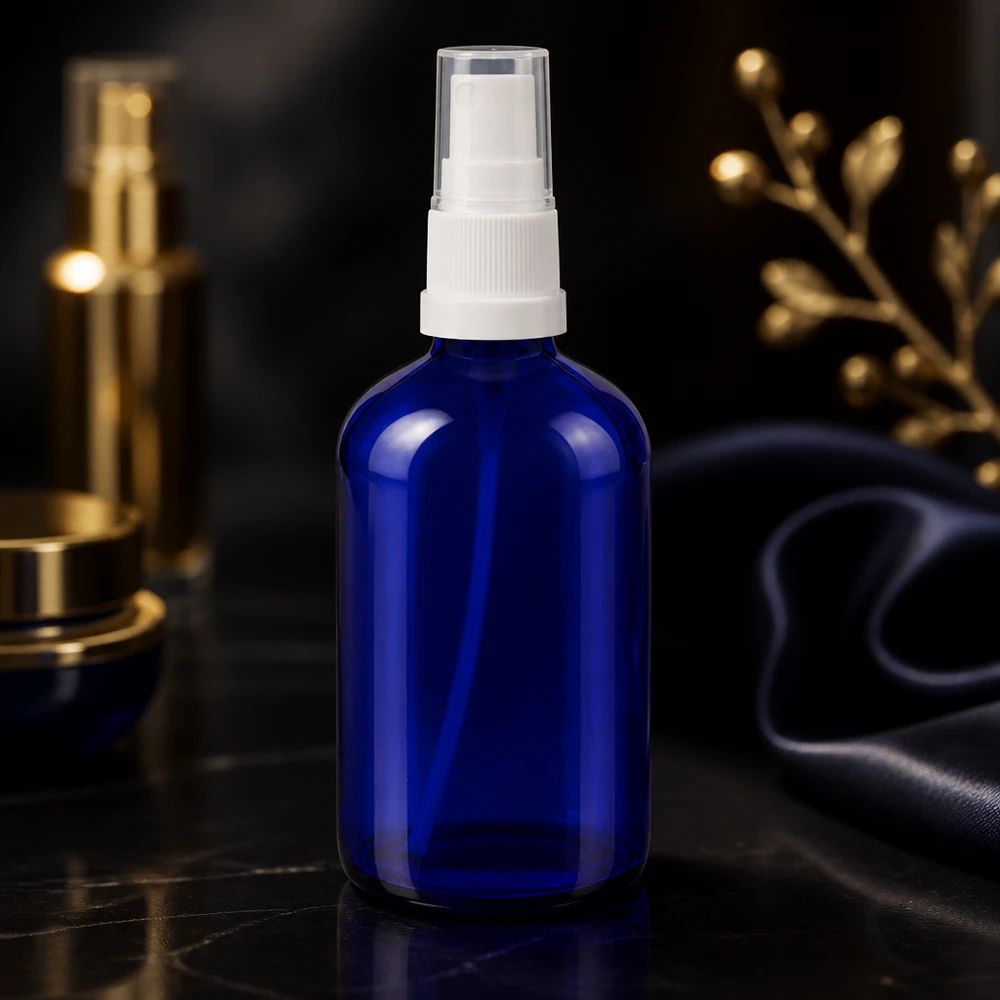 Lékárenská lahvička modrá 100ml stříkací nástavec bílý Schlanke blaue Glasflasche 100ml mit weißem Zerstäuberpumpe ideal für ätherische Öle