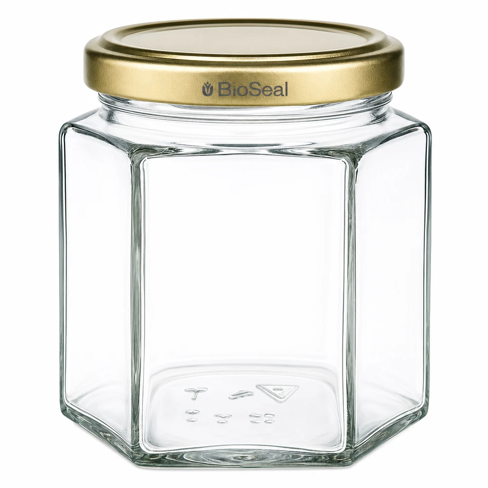 520g Honigglas mit goldenem Deckel BioSeal UNiTWIST 520g Honigglas hexagonal transparent mit goldenem BioSeal Deckel für Imker und Honigabfüllung