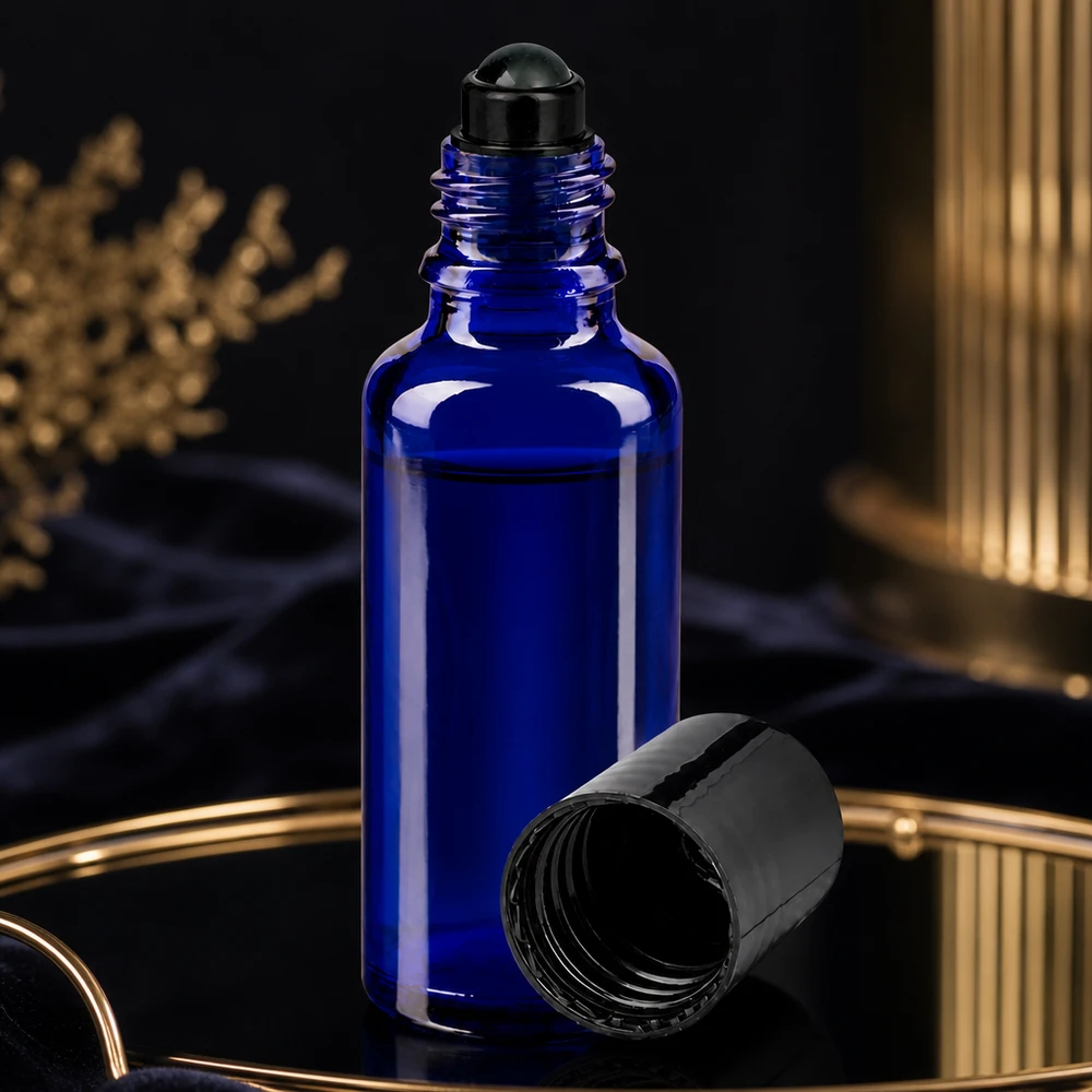 Lékárenská lahvička modrá 30ml roll-on s černým uzávěrem Hochwertige blaue Roll-On Flasche aus UV-Schutzglas 30ml mit schwarzem Applikator