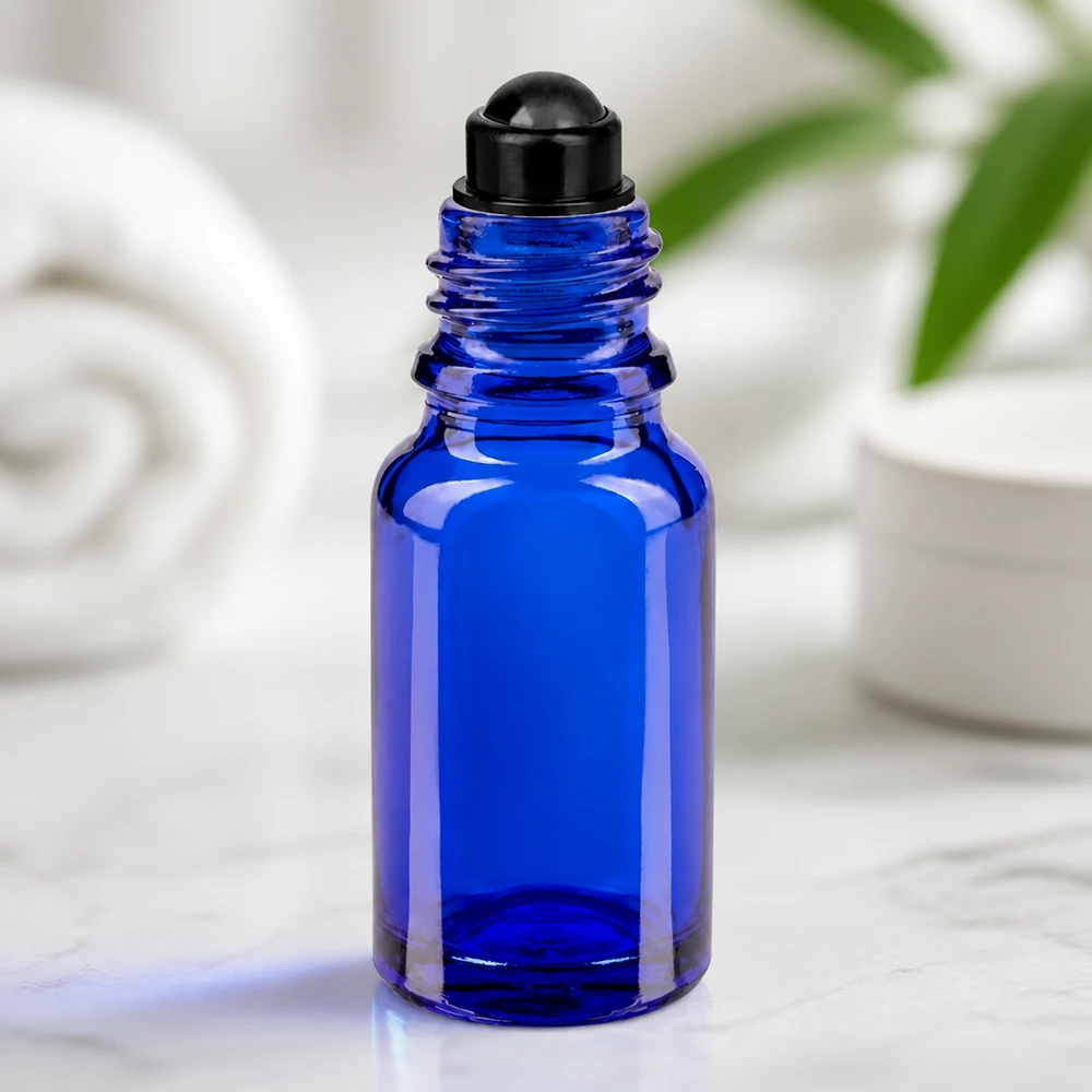 Lékárenská lahvička modrá 10ml roll-on černá uzávěr Kompakte blaue Glasflasche 10ml mit Roll-On Applikator für Aromatherapie und Kosmetik