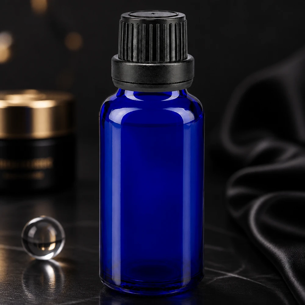 Lékárenská láhev modrá 20ml kapátko s nalévacím kroužkem 2mm černý tamper-evidentní uzávěr Kleine blaue Flasche 20ml aus UV-Schutzglas mit schwarzem Sicherheitsverschluss und Tropfer