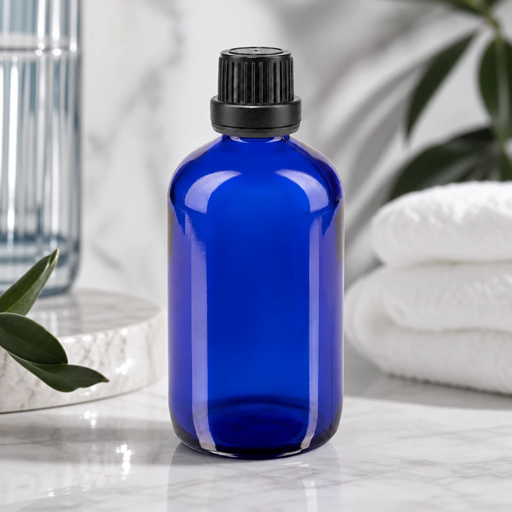 Blaue 100ml Glasflasche mit schwarzem Kunststoffdeckel ideal zur Aufbewahrung von Ölen