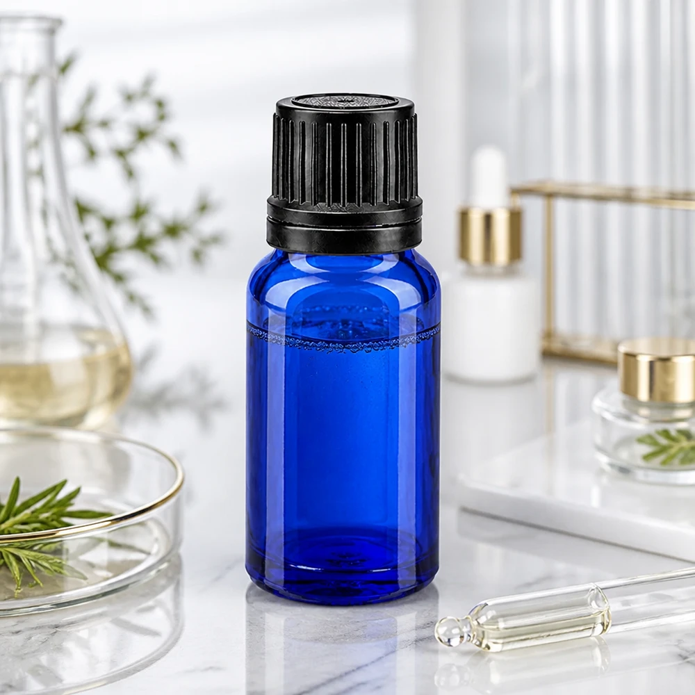 10ml Dosierflasche Kobaltblau mit schwarzem OV-Verschluss und 1mm Öffnung aus Apothekenglas