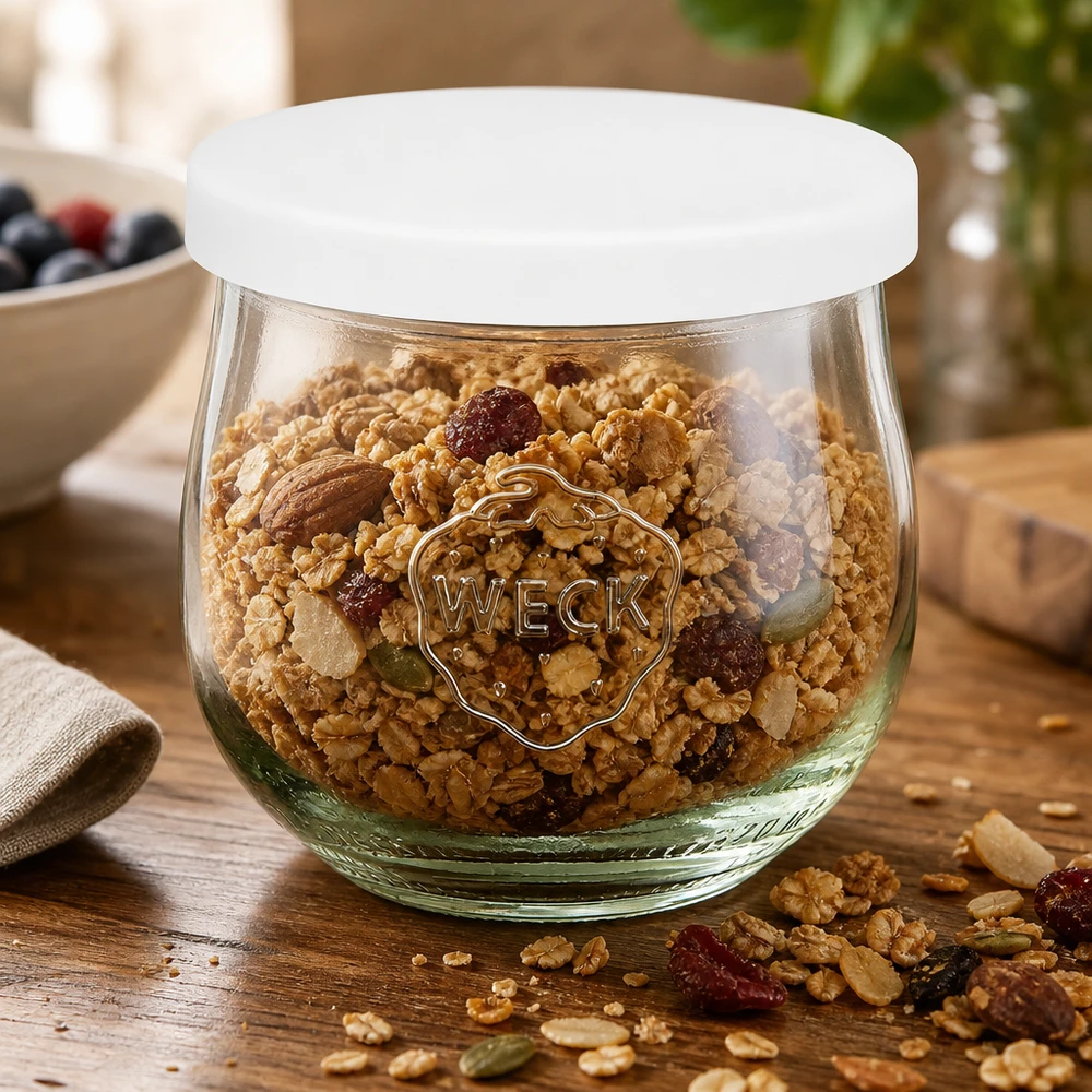 WECK Vorratsglas 370ml mit Müsli gefüllt weißer Silikondeckel Tulpenform Küche Aufbewahrung Nüsse Trockenfrüchte