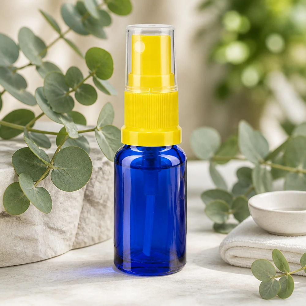 30ml Zerstäuberflasche Apothekenglas blau mit gelbem Sprühkopf und UV-Schutz