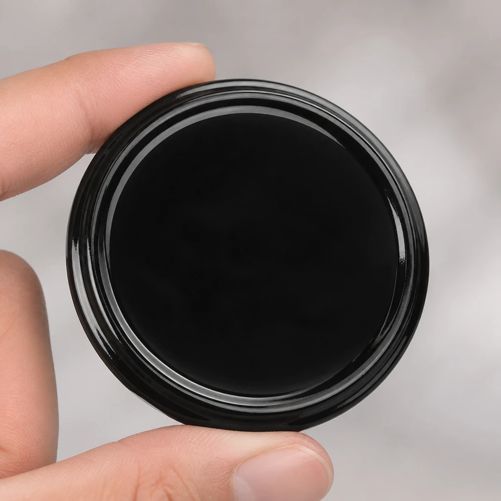 82mm víko BasicSeal černé (TO82) UNiTWIST 82 mm víčko BasicSeal, černé, TO82, UNiTWIST, lesklý povrch, detailní záběr