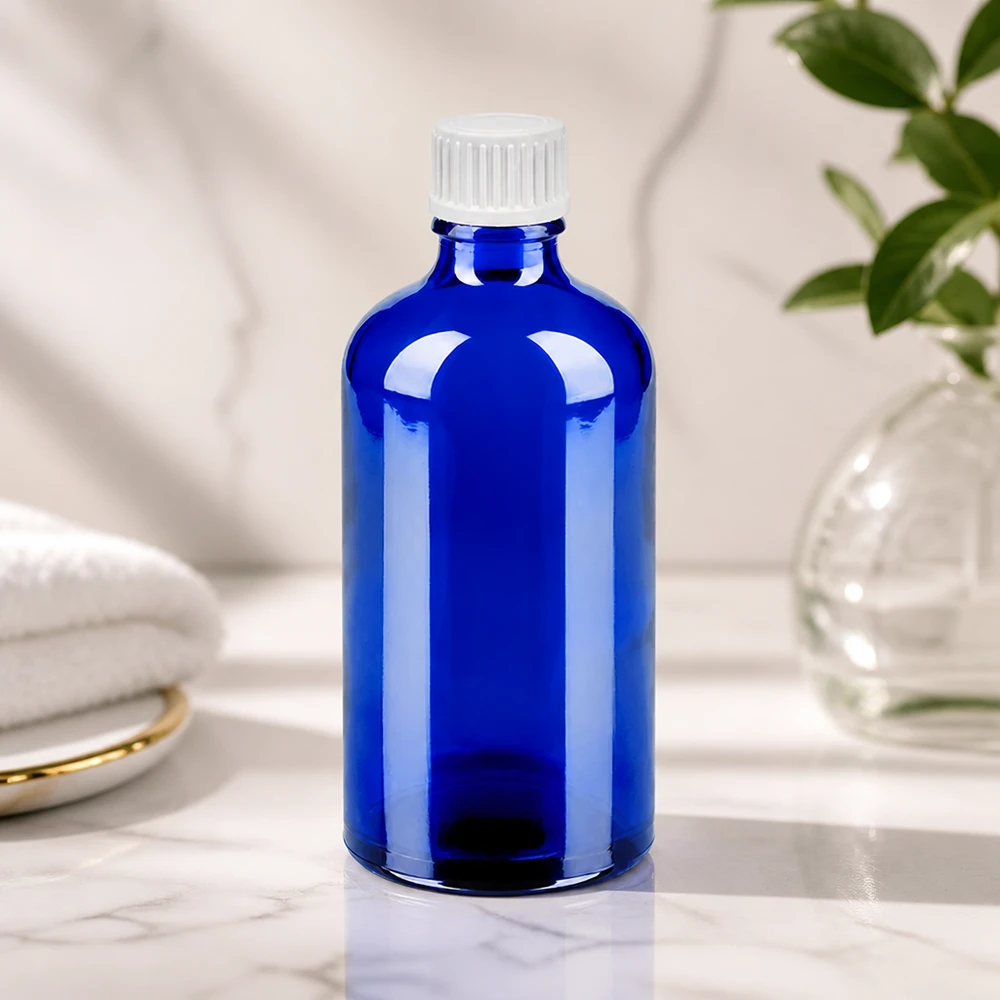 Professionelle Tropfflasche BlueLine UT18/100 aus blauem Glas mit weißem Standardgewinde