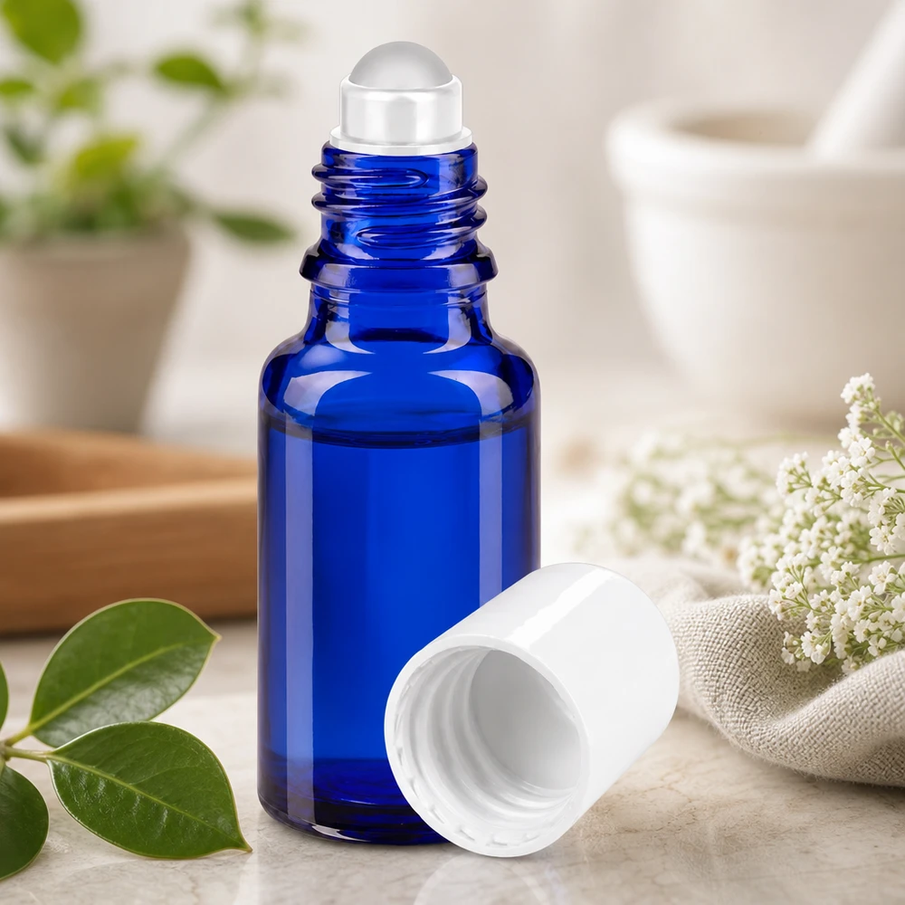 Lékárenská lahvička modrá 20ml roll-on uzávěr bílý Schlanke 20ml Roll-On Flasche in Kobaltblau mit weißem Verschluss für Aromatherapie