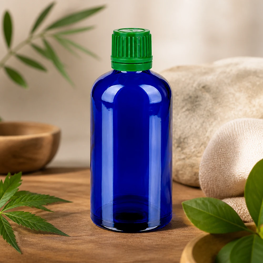 100ml láhev 11mm šroubovací uzávěr zelený uzávěr s ochranou proti manipulaci BlueLine UT18/100 Kompakte 100ml blaue Glasflasche mit kindersicherem grünem Verschluss für sichere Aufbewahrung