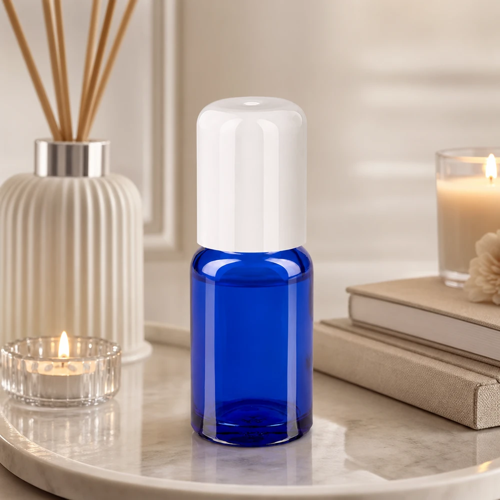 Kleine 10ml Roll-On Flasche aus dickem blauen Glas mit hygienischem Rollball-Verschluss