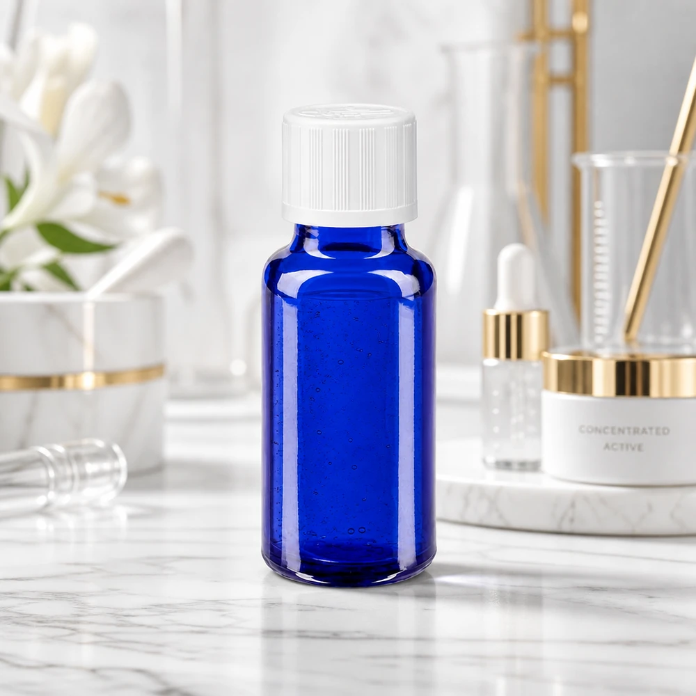 Kleine kobaltblaue Glasflasche 20ml mit kindersicherem weißen Verschluss Detailansicht