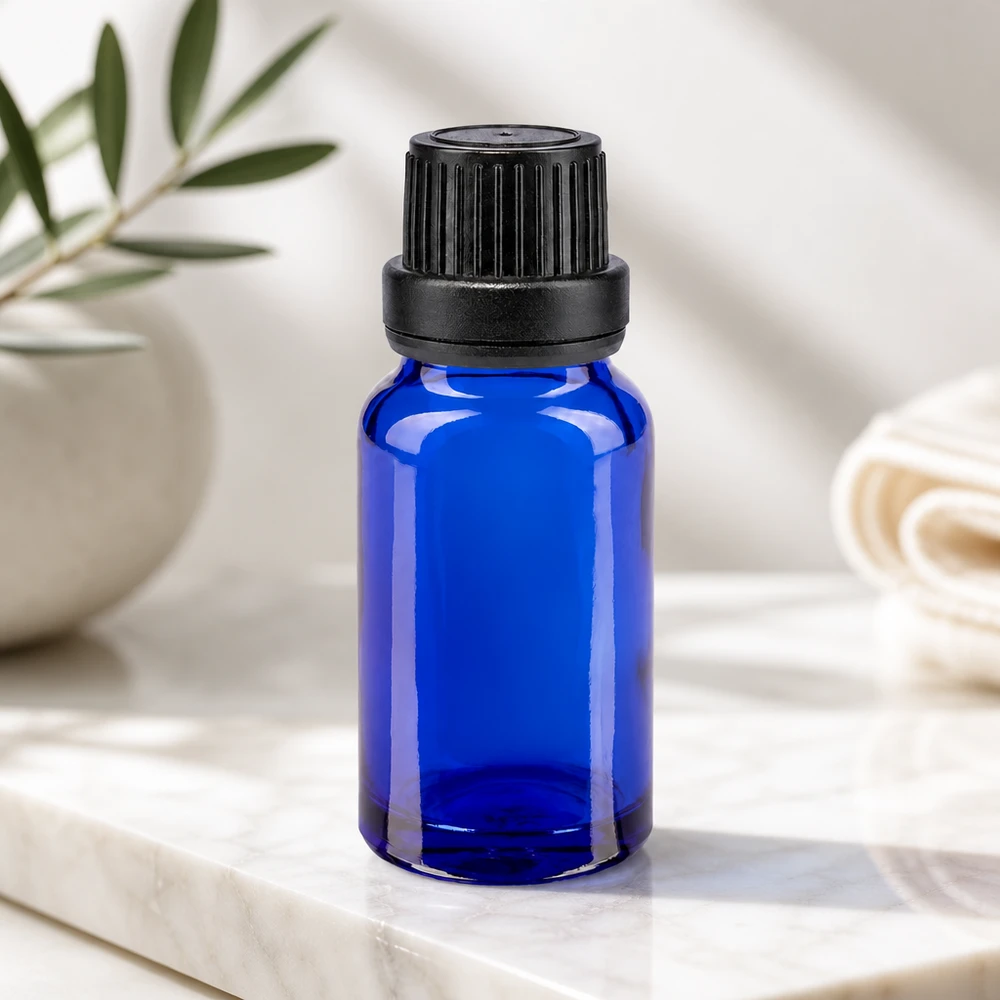 Kompakte blaue Glasflasche 10ml mit geripptem Schwarzverschluss und 2mm Einsatz für Serum und Essenzen