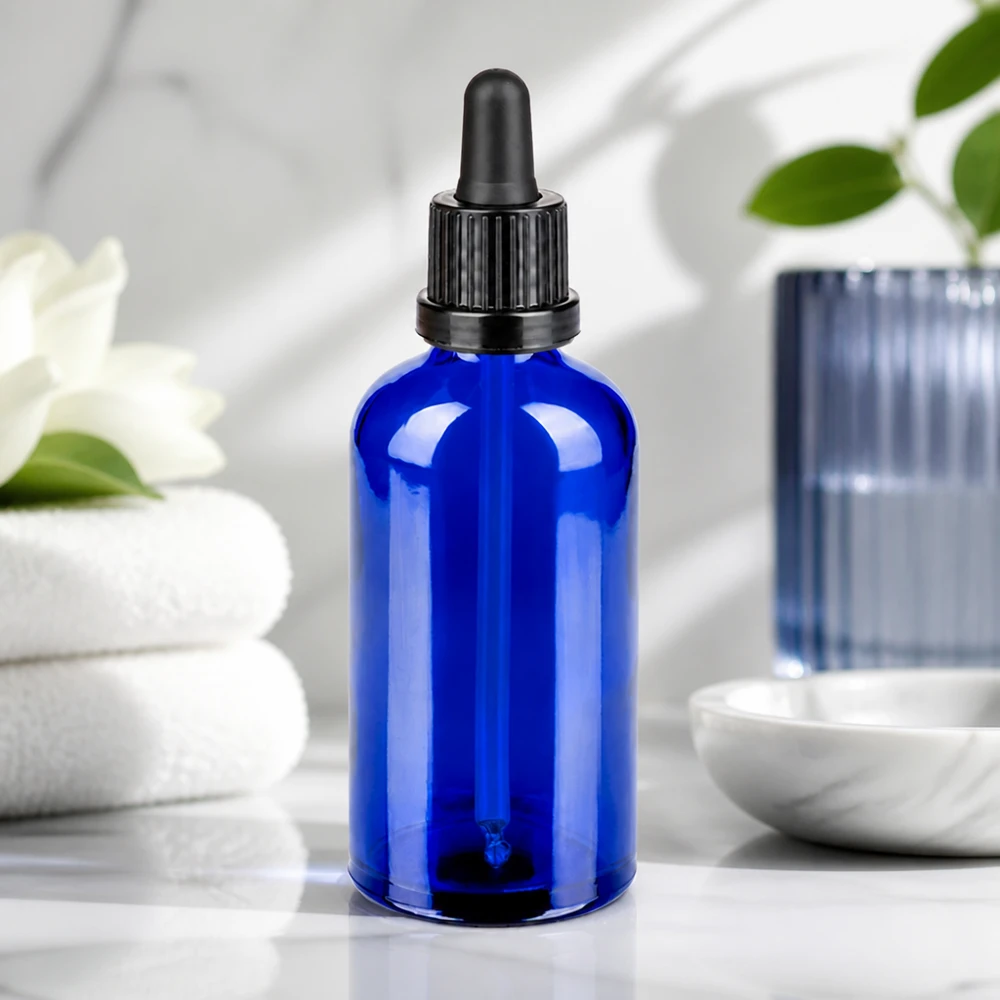 100ml pipetovací láhev černá s uzávěrem proti neoprávněné manipulaci BlueLine UT18/100 Premium Glasflasche 100ml kobaltblau mit schwarzer Pipette für hygienische und sichere Lagerung