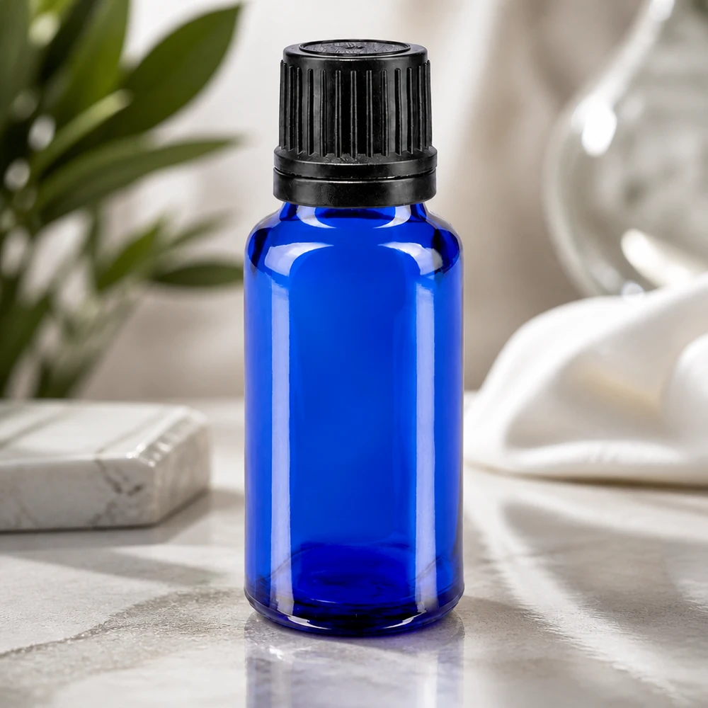 Lékárenská lahvička modrá 20ml kapací uzávěr nalévací kroužek 1mm černý tamper-evidentní uzávěr. Kleine blaue 20ml Tropfflasche mit schwarzem Schraubdeckel für Öle und Tinkturen
