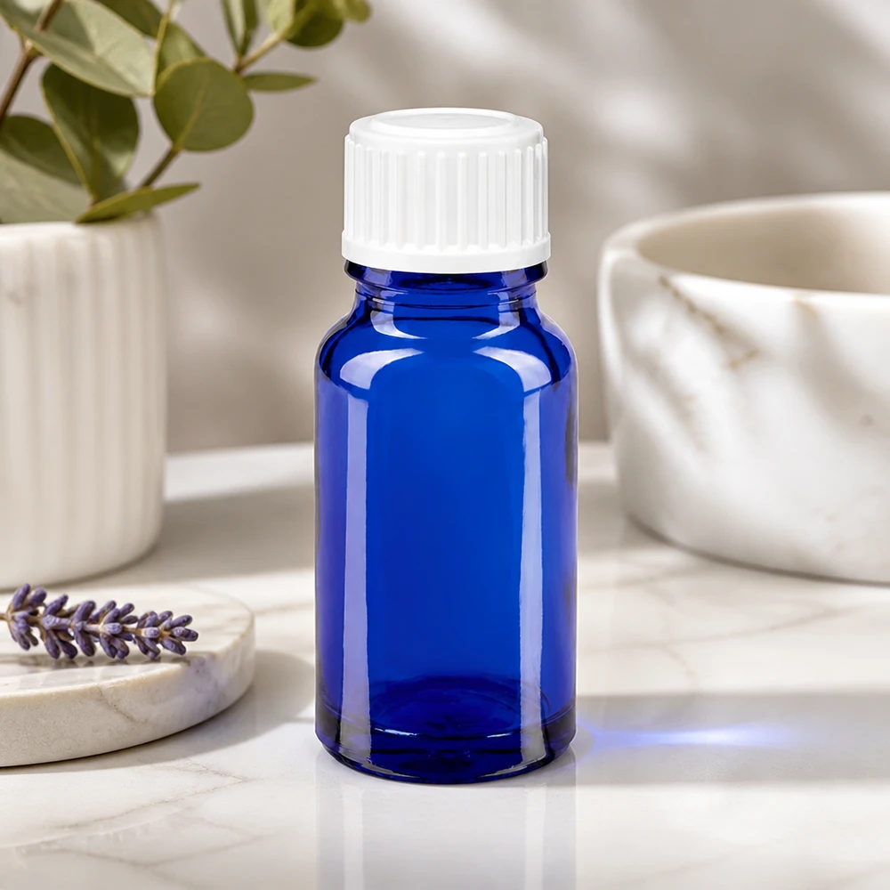 Runde blaue 10ml Glasflasche mit weißem Tropferverschluss für ätherische Öle