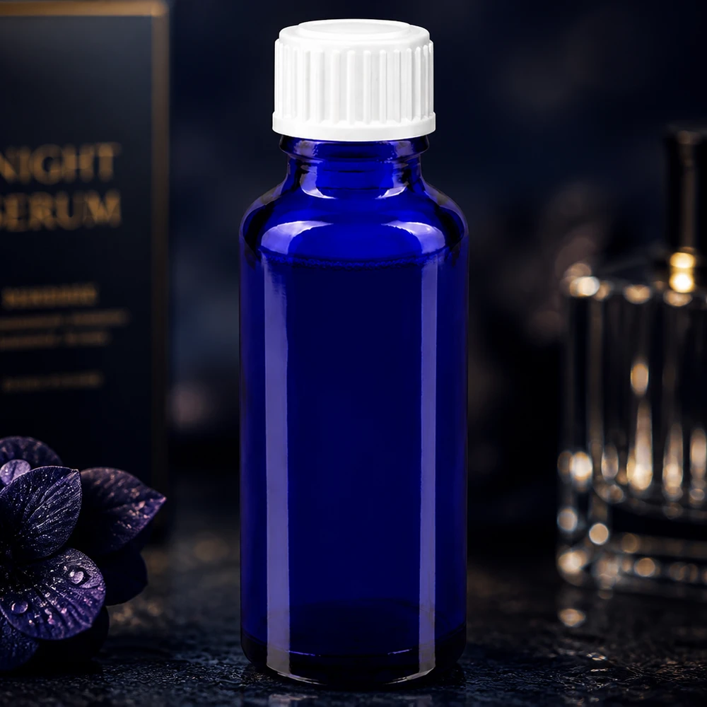 Lékárenská lahvička modrá 30ml šroubovací uzávěr bílý globule standardní 30ml blaue Pharmaglasflasche Standard mit weißem Originalitätsverschluss für Kosmetikserums