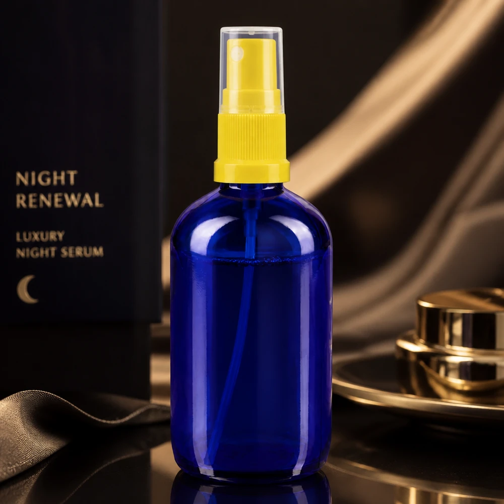 Kleine blaue Kosmetiksprayflasche 100ml aus Apothekenglas mit gelbem Pumpaufsatz