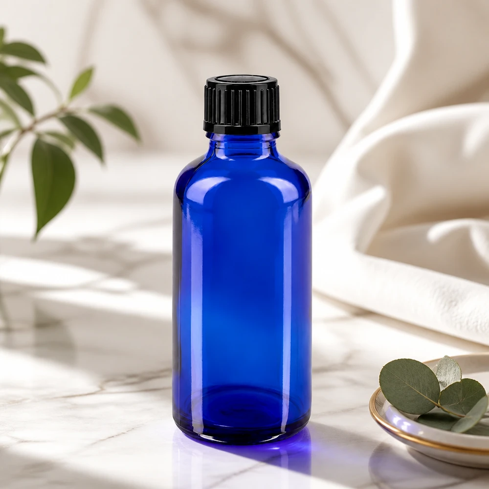 Lichtschutzflasche 50ml in Blauglas mit schwarzem Kunststoffverschluss für Aromatherapie