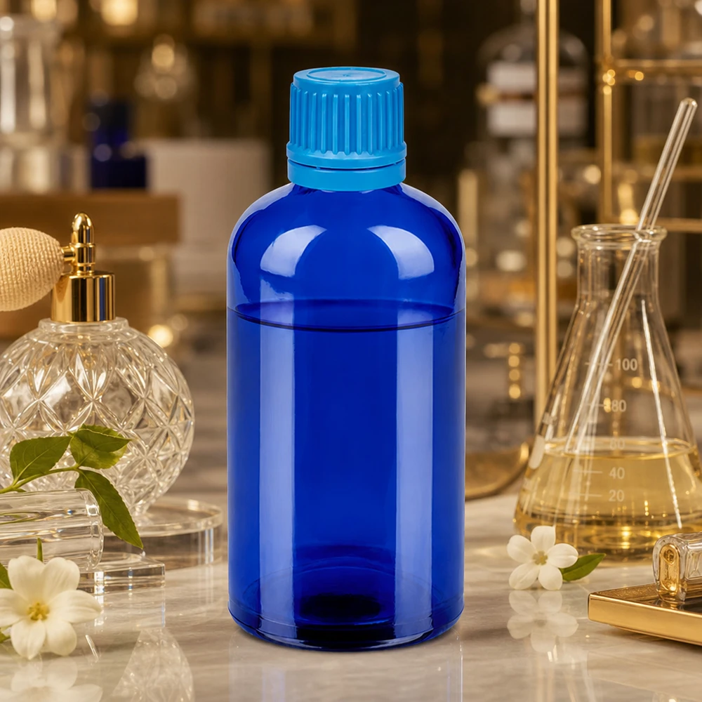 100ml láhev 11mm šroubovací uzávěr modrý uzávěr s ochranou proti manipulaci BlueLine UT18/100 Hochglänzende 100ml Glasflasche in Kobaltblau mit ergonomischem Schraubverschluss