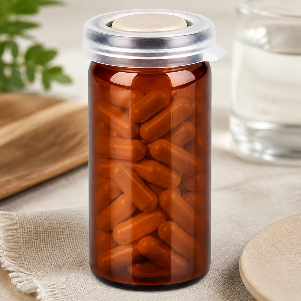 Zylindrisches Pillenglas 10ml mit durchsichtigem Deckel und dicht gepackten Kapseln