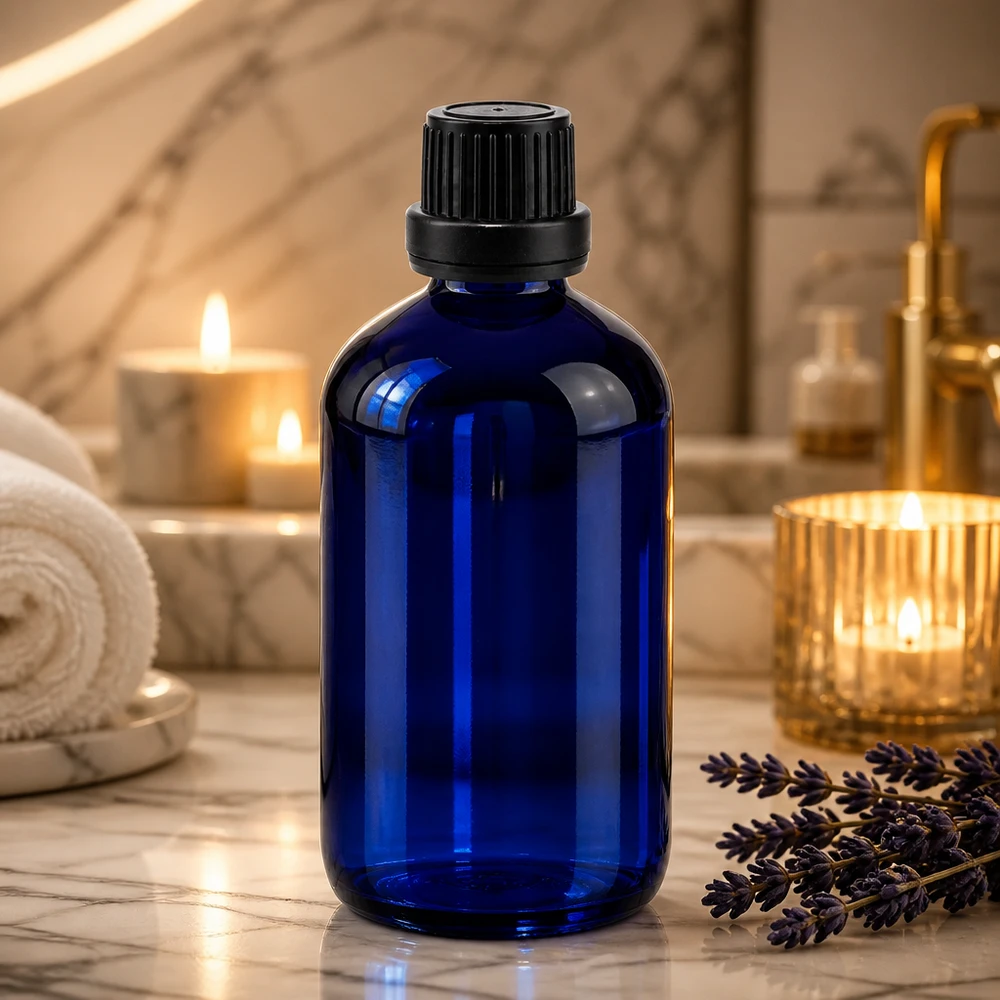Lékárenská láhev modrá 100ml šroubovací uzávěr černý tamper evident uzávěr. Blaue Apothekerglasflasche 100ml mit kindersicherem Schwarzdeckel für Naturkosmetik