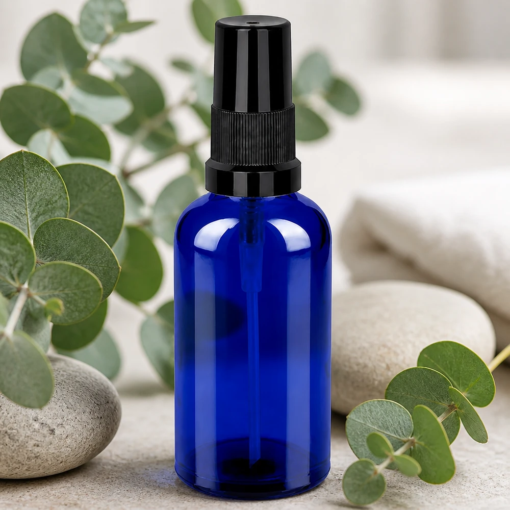 Professionelle 50ml Zerstäuberflasche aus Blauglas mit gleichmäßiger Sprühverteilung