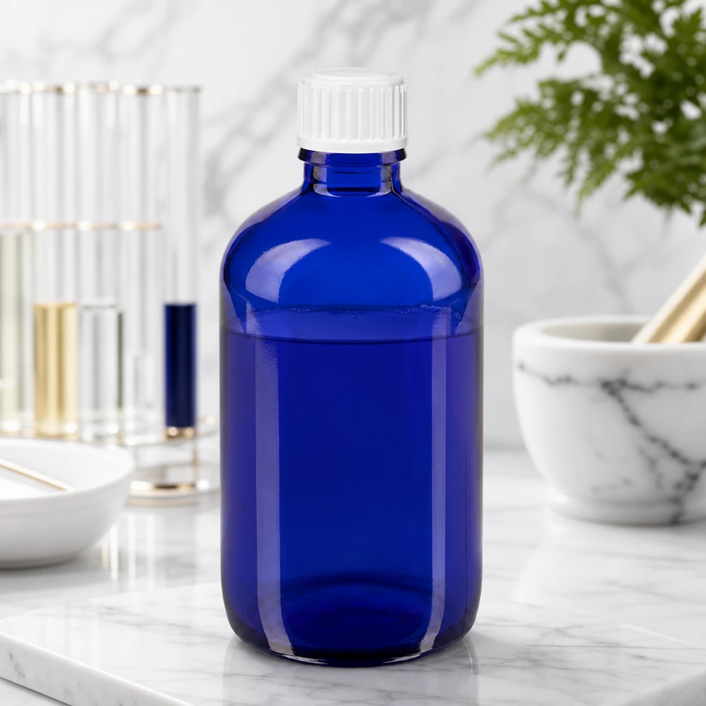 Lékárenská láhev modrá 100ml kapátko bílé 0,8mm standardní uzávěr Blaue 100ml Rundflasche mit weißem Schraubverschluss und 0.9mm Tropfeinsatz für Naturheilkunde