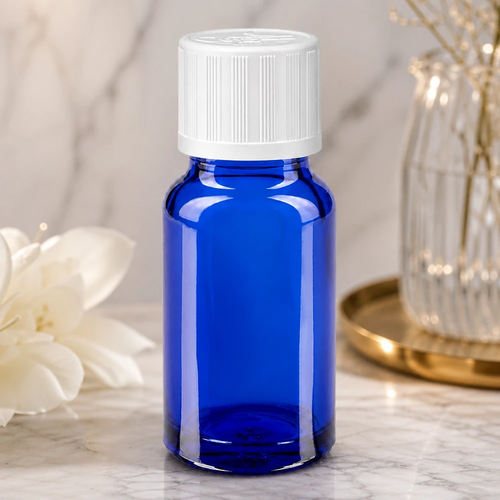 Blaue 10ml Tropfflasche aus Glas mit weißem Kindersicherheitsverschluss Seitenansicht