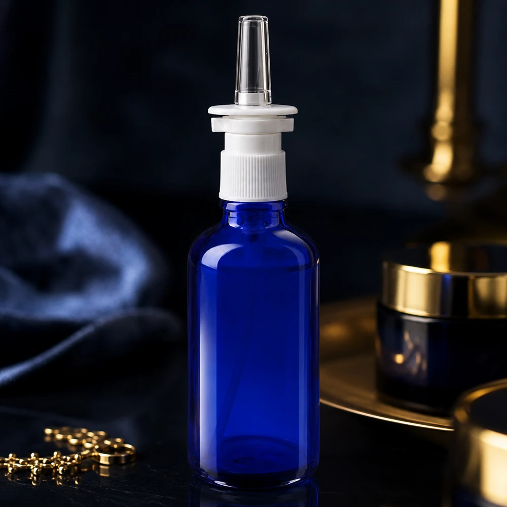 Hochwertige Nasenspray-Glasflasche 50ml in Blau mit weißem Sprühaufsatz für Apotheken