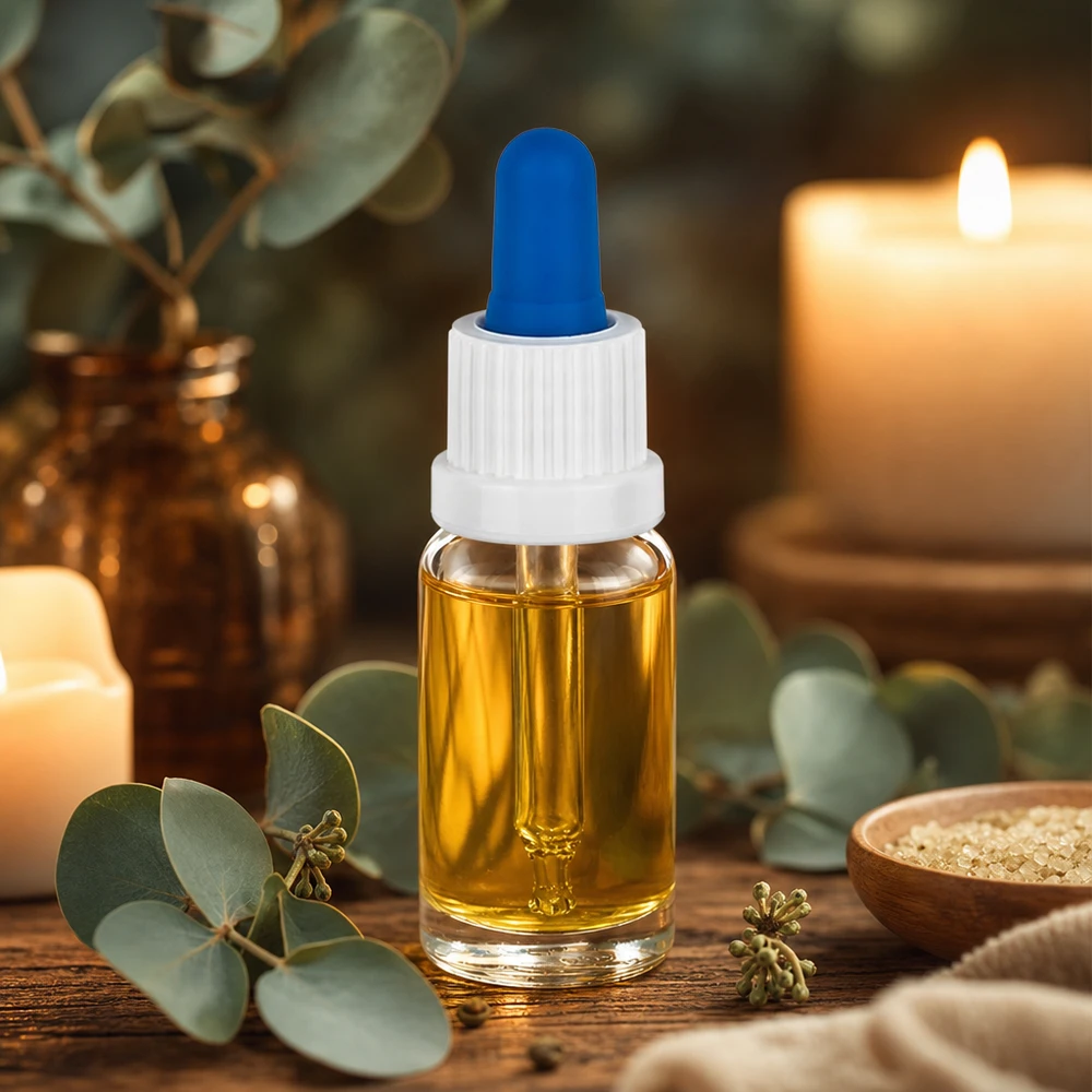 10ml Pipettenflasche weiss blau mit gelbem Naturöl auf rustikalem Holz mit Kräuterdeko
