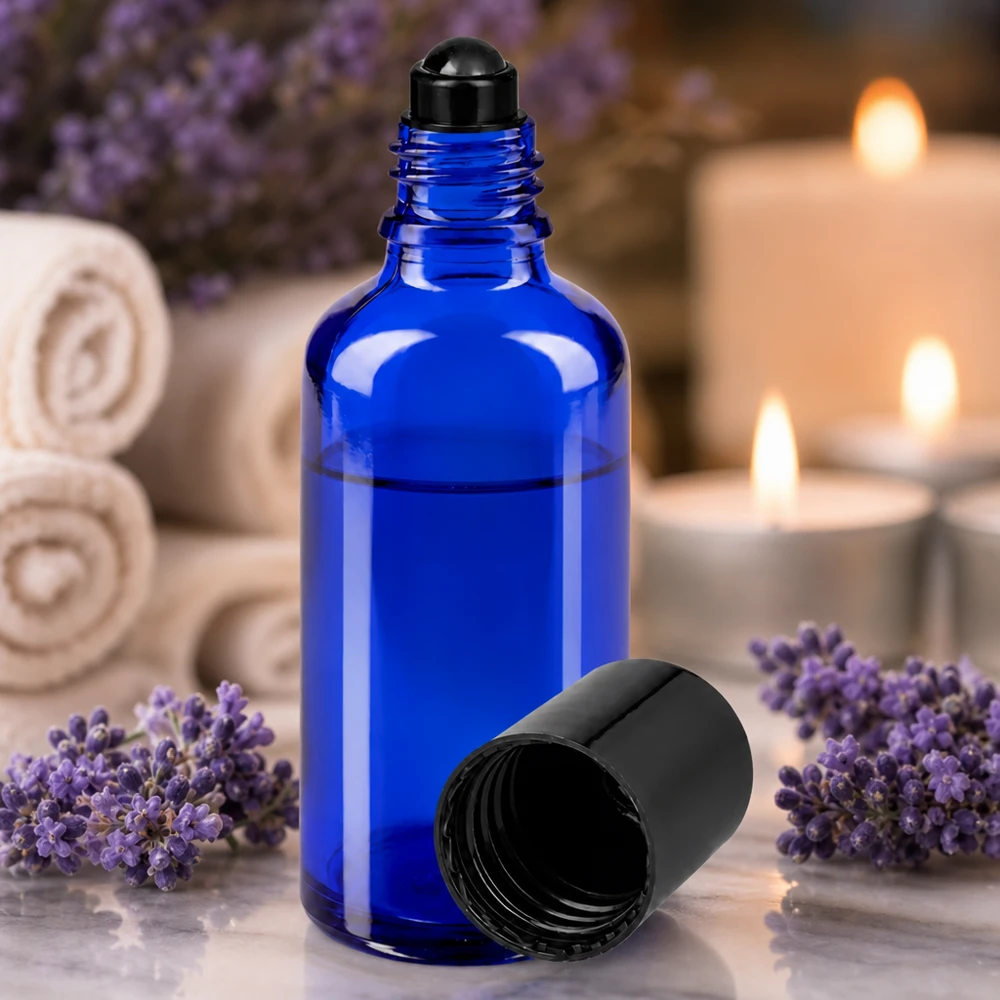 Lékárenská lahvička modrá 50ml roll-on uzávěr černý 50ml blaue Rollerflasche aus hochwertigem Glas mit schwarzem Kugelverschluss für Naturkosmetik