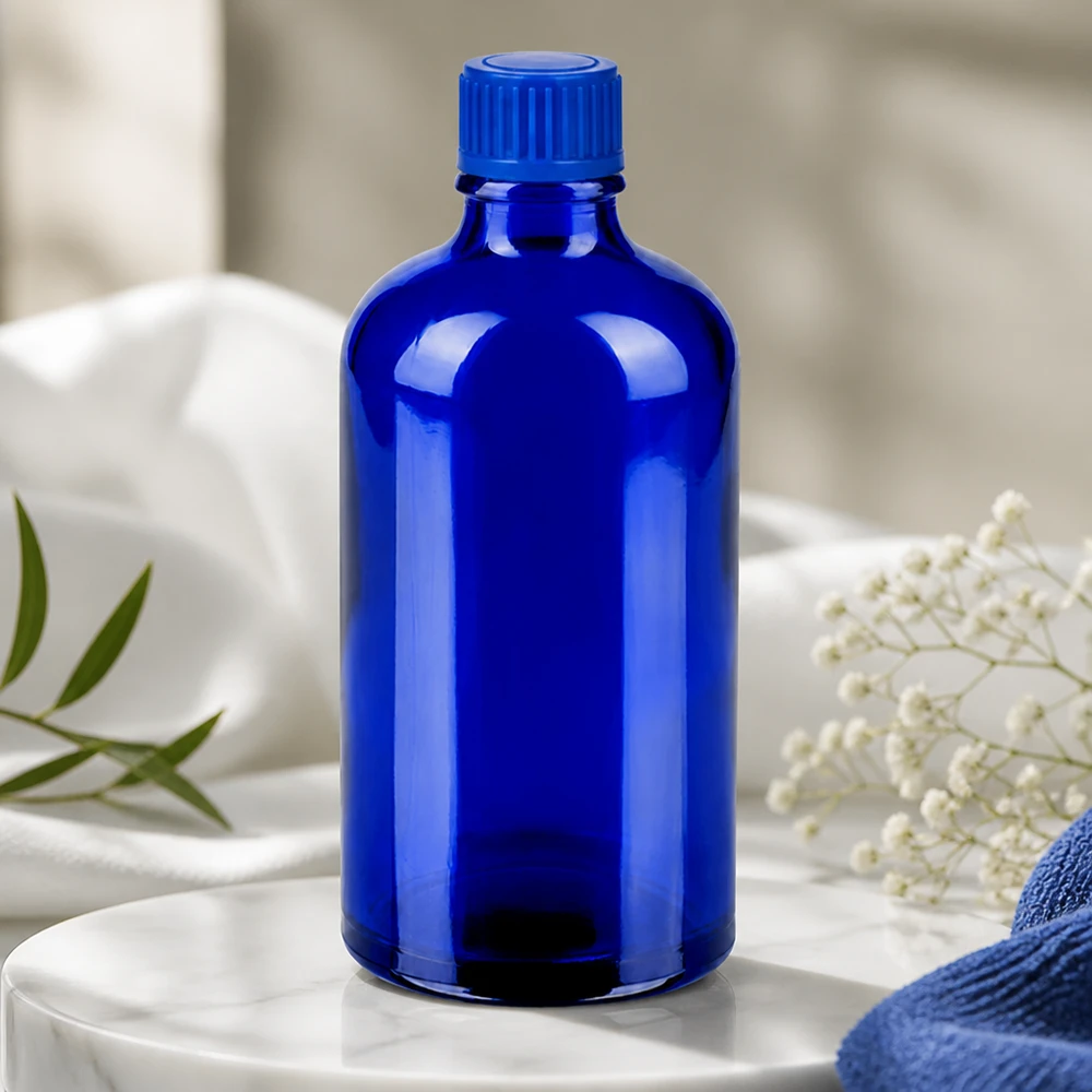 Hochglänzende 100ml Blauglasflasche STD Format für anspruchsvolle Produktpräsentation