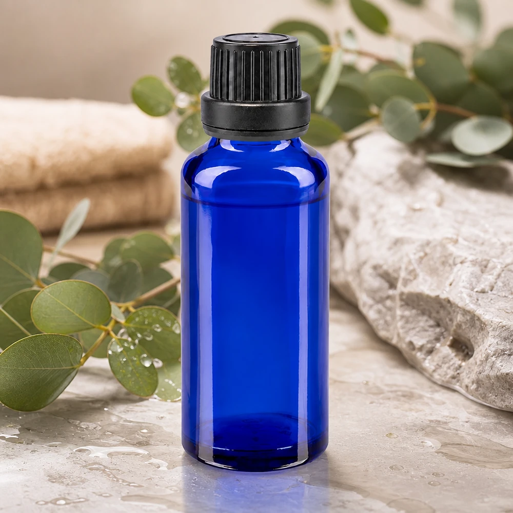 Zylindrische blaue Apothekerflasche aus Borosilikatglas 30ml mit 11mm Verschluss schwarz