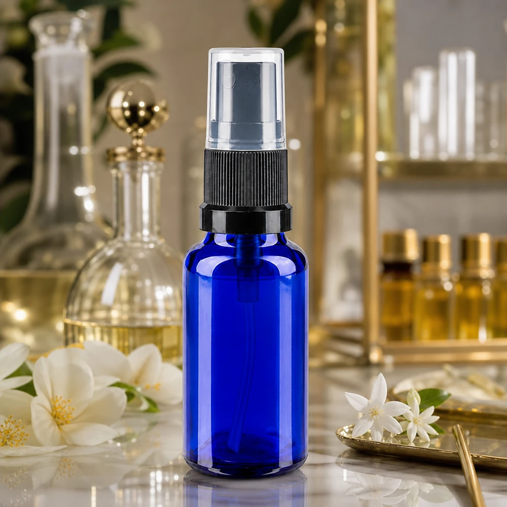 Hochwertige 20ml Sprühflasche Kobaltblauglas mit schwarzem Zerstäuberkopf Standard-Ausführung