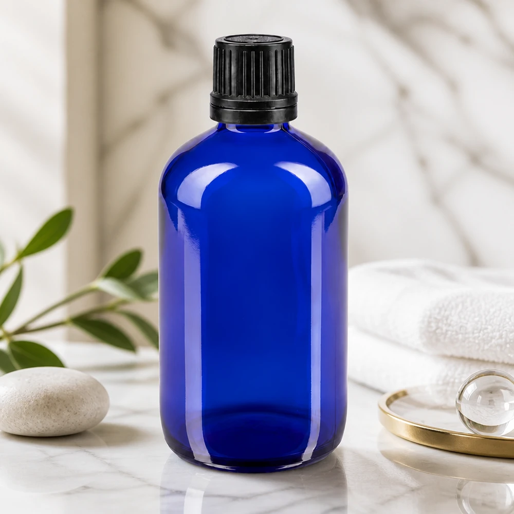 Runde 100ml blaue Apothekerflasche aus Glas mit schwarzem OV-Verschluss Spa-Ambiente
