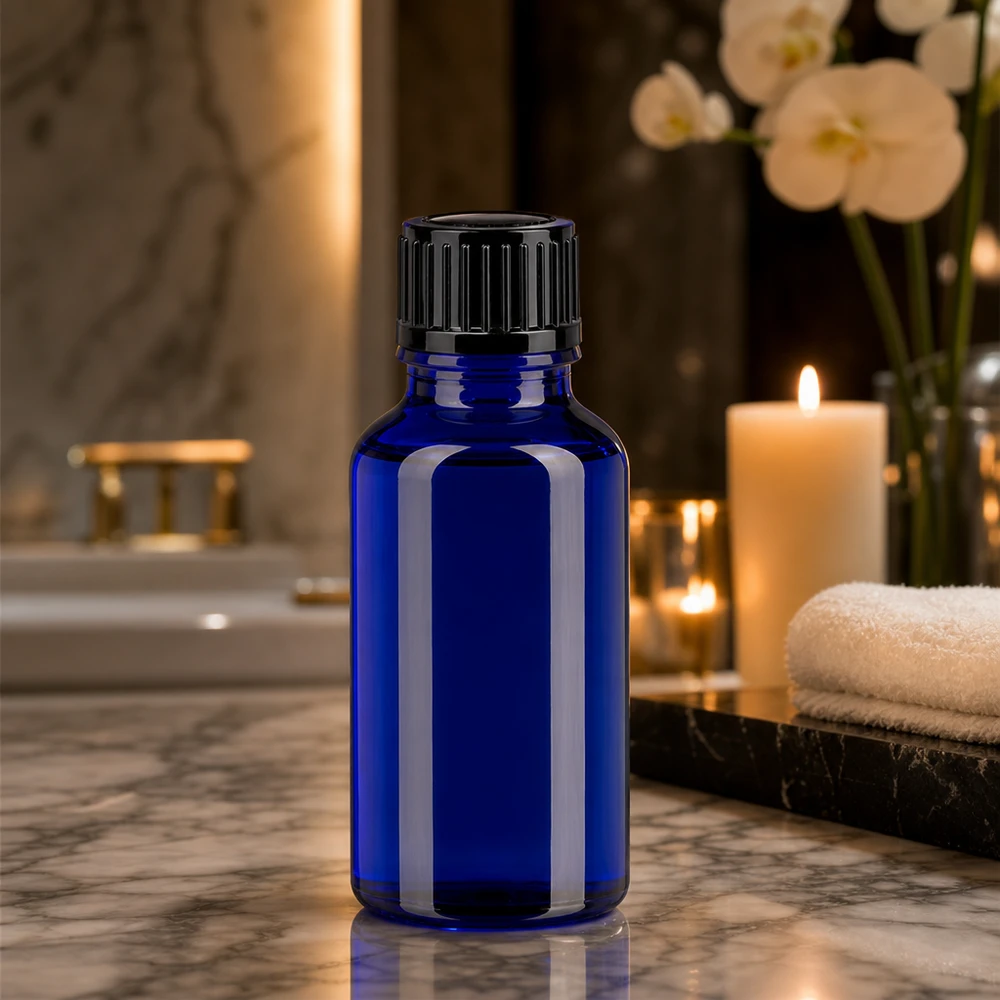 Lékárenská lahvička modrá 20ml kapací uzávěr standardní černý 1mm Hochwertige blaue Glasflasche 20ml mit Dosierverschluss für Naturkosmetik und Serum