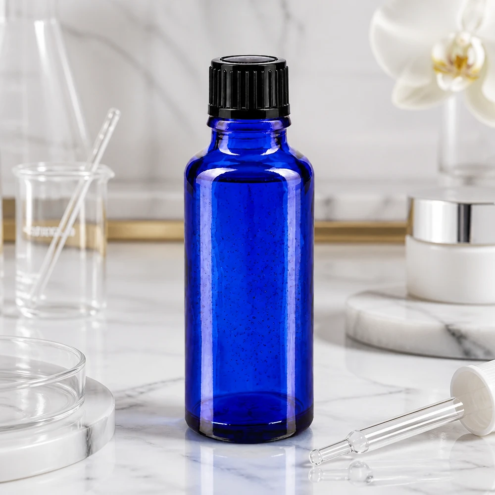 Lékárenská láhev modrá 30ml šroubovací uzávěr černá standardní Zylindrische 30ml Apothekerflasche aus kobaltblauem Glas mit schwarzem 11mm Verschluss