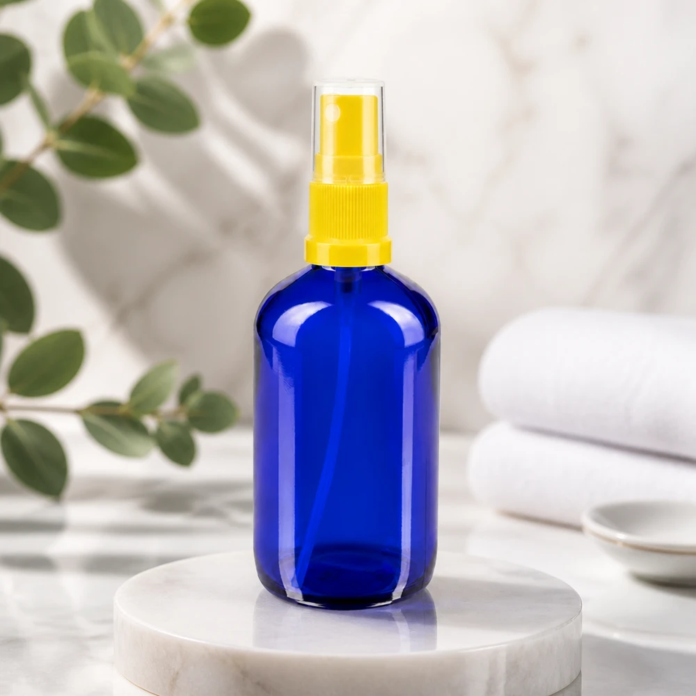 Lékárenská lahvička modrá 100ml s rozprašovacím uzávěrem žlutá 100ml Lichtschutzglas Sprayflasche blau mit gelbem Pumpaufsatz wiederbefüllbar