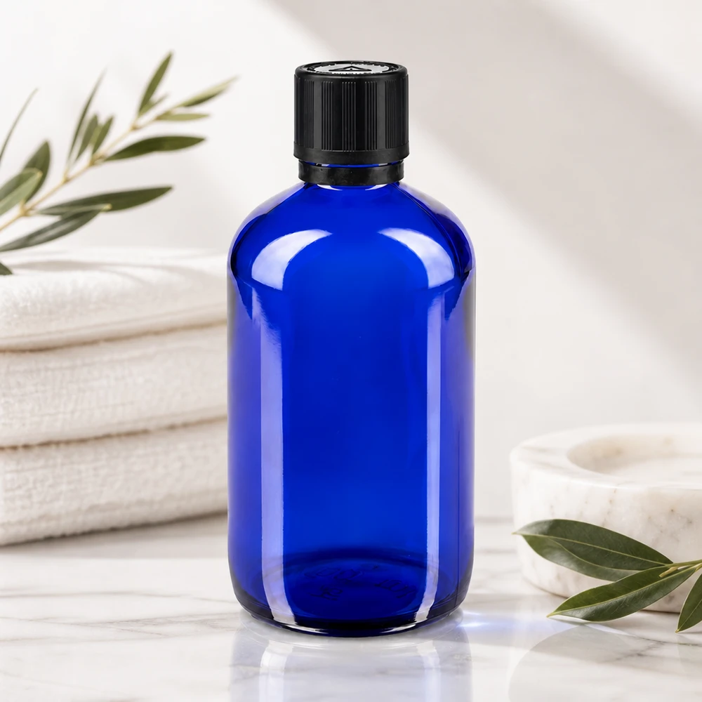 Lékárenská láhev modrá 100ml kapací uzávěr prémiový 1mm černý uzávěr odolný proti manipulaci dětmi. Blaue 100ml Glasflasche mit Tropfer Kindersicherheitsverschluss ideal für ätherische Öle