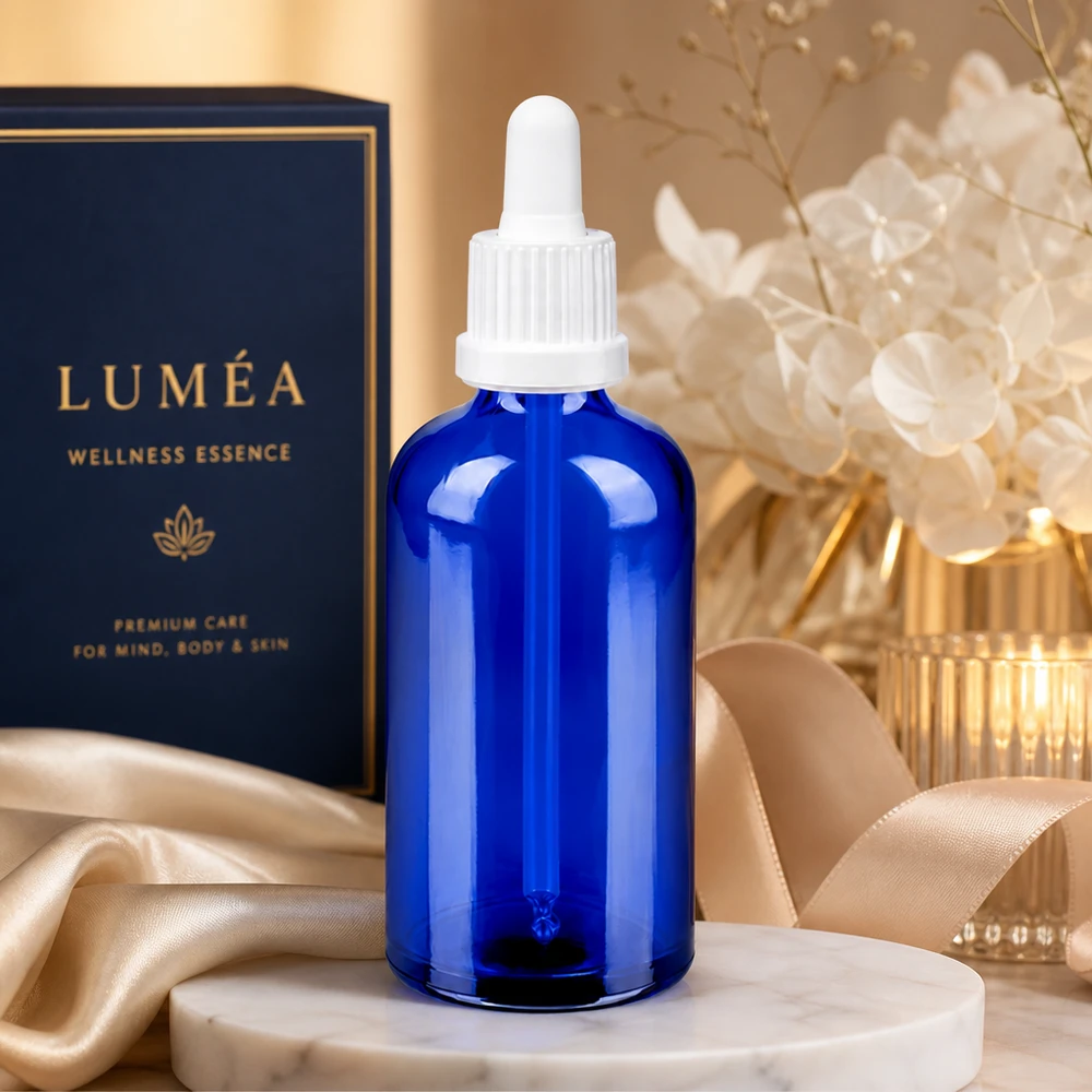 Klassische 100ml Tropfflasche in Kobaltblau mit weißer Pipette für medizinische und kosmetische Anwendung