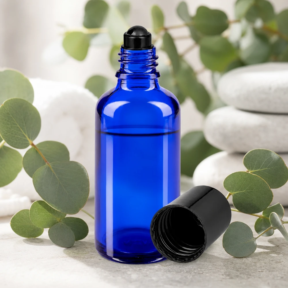 Lékárenská lahvička modrá 50ml roll-on uzávěr černý Zylindrische blaue 50ml Roll-On Glasflasche mit mattem Schwarzdeckel für Naturkosmetik