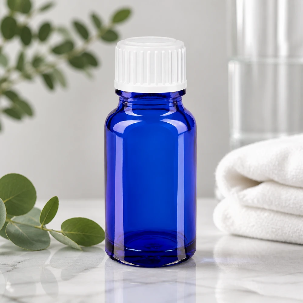 Lékárenská lahvička modrá 10ml šroubovací uzávěr bílé globule standardní. Dunkelblaue Pharmaglasflasche 10ml mit geripptem Schraubdeckel in Weiß